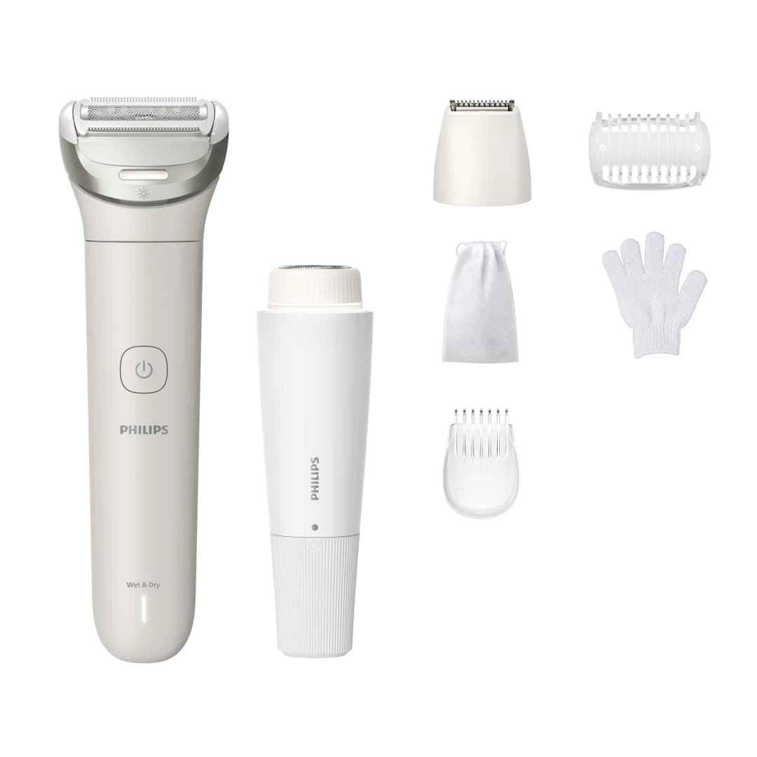 Ein weißer Philips Nass- und Trockenrasierer mit Aufsätzen. Enthält einen Trimmer, einen kleinen Beutel, einen Handschuh und einen 3-mm-Kamm.