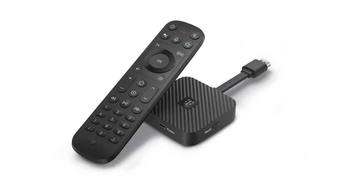 Schwarze Fernbedienung und kompakter schwarzer Streaming-Player mit T-Logo.