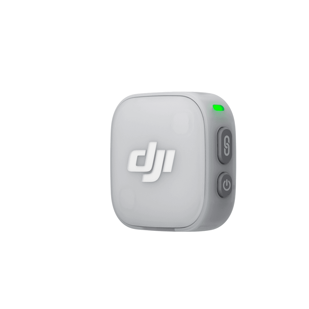 Ein grauer Würfel mit DJI-Logo und grüner LED.