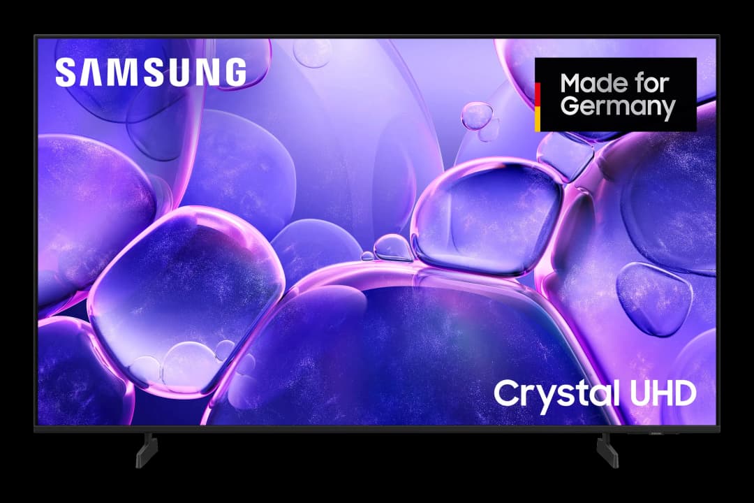 Samsung Crystal UHD Fernseher mit lila Blasen-Hintergrund und "Made for Germany"-Label.